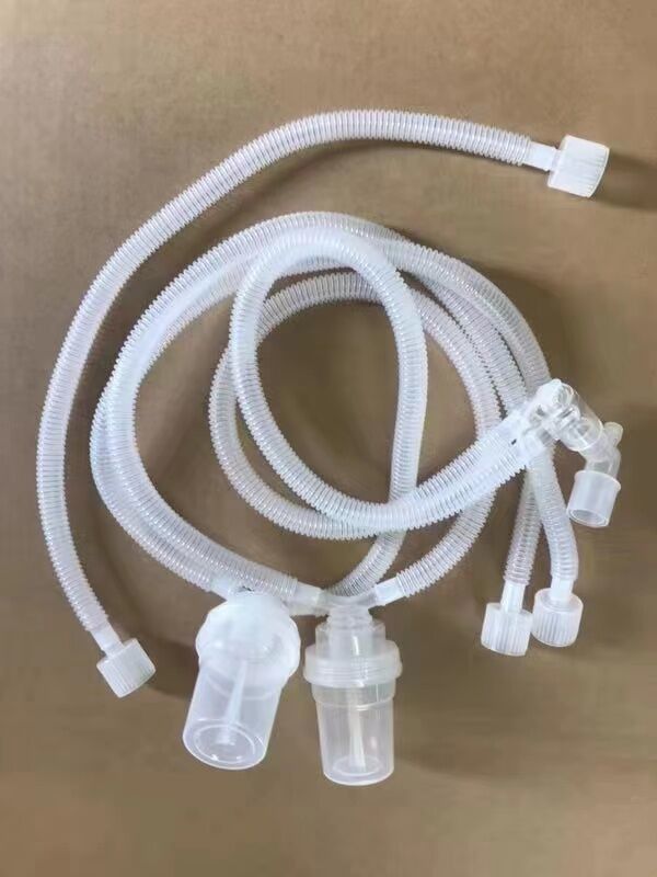 Optimal Respiratory Support for Infants Smooth Bore Breathing Circuit with Double Water Traps and Additional Limb
